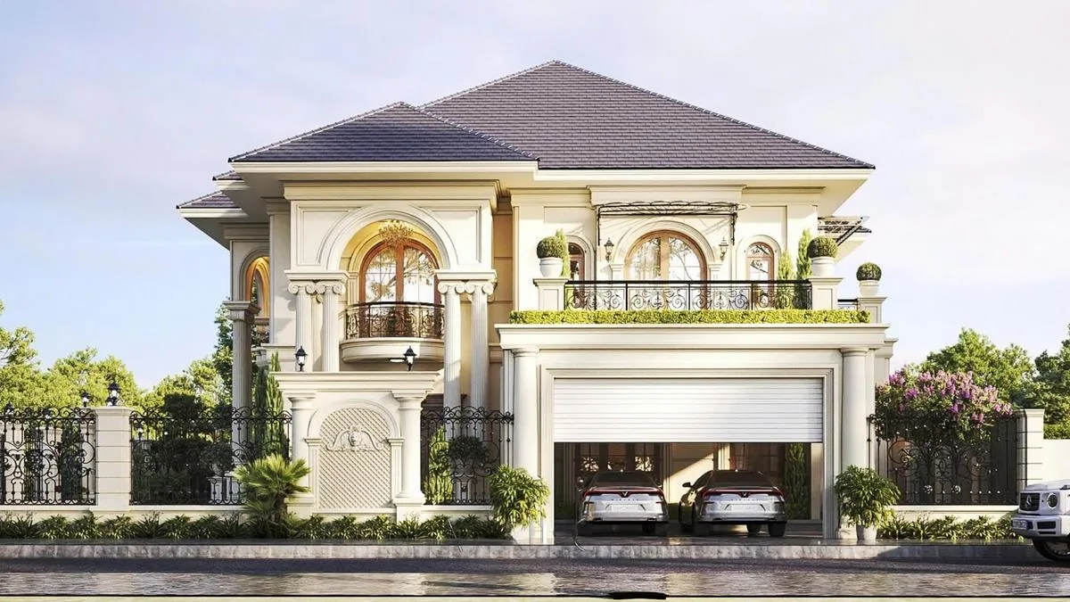 Nhà 2 tầng tân cổ điển có gara ôtô phía trước với hệ thống cửa cuốn